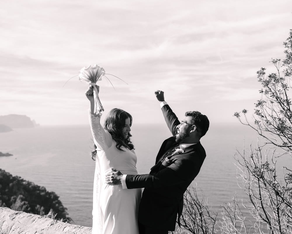 Akilesh, founder of A Storyteller Production, celebrating his own multicultural wedding on a Mallorca clifftop
